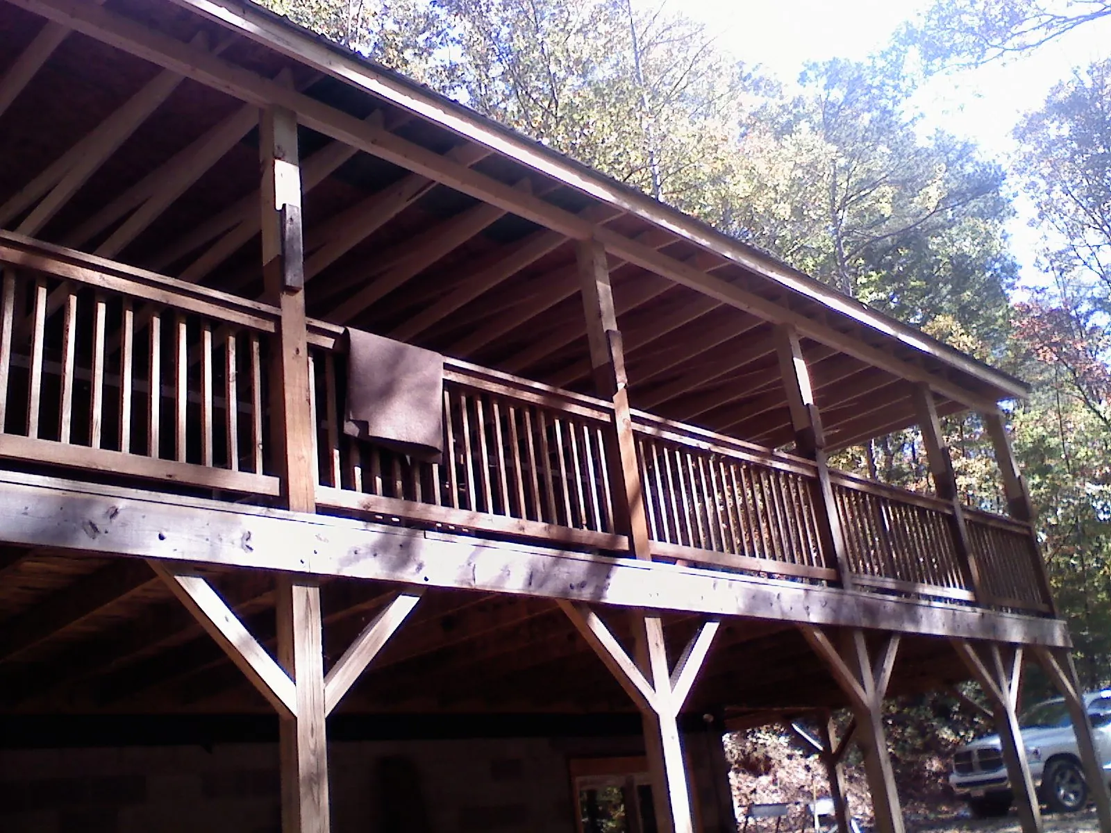 Timber framing under a new elevated porch and deck — Roof Leak Repair in Palm Beach Gardens by Roofing Brothers